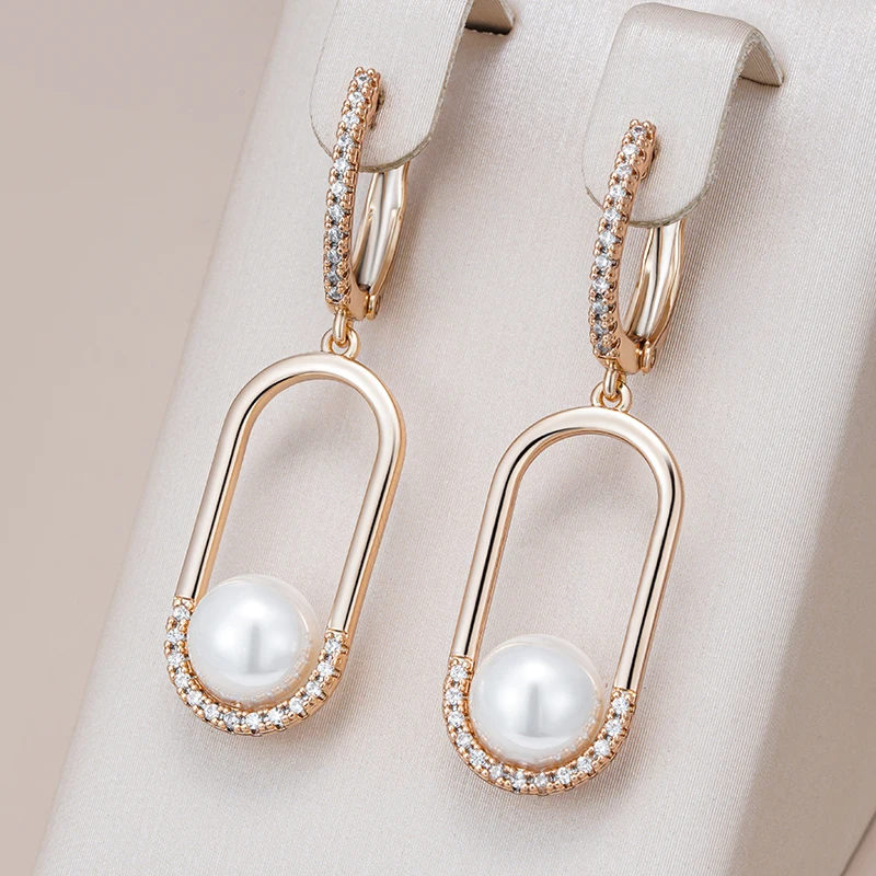 Boucles d'oreilles creuses élégantes en perles brillantes
