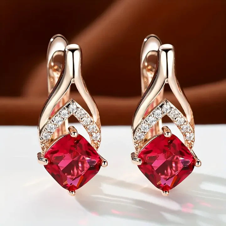 Boucles d'oreilles élégantes en cristal rouge et or