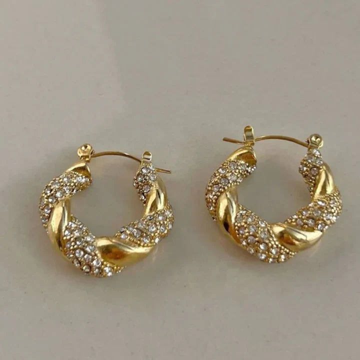 Boucles d'oreilles créoles tressées dorées