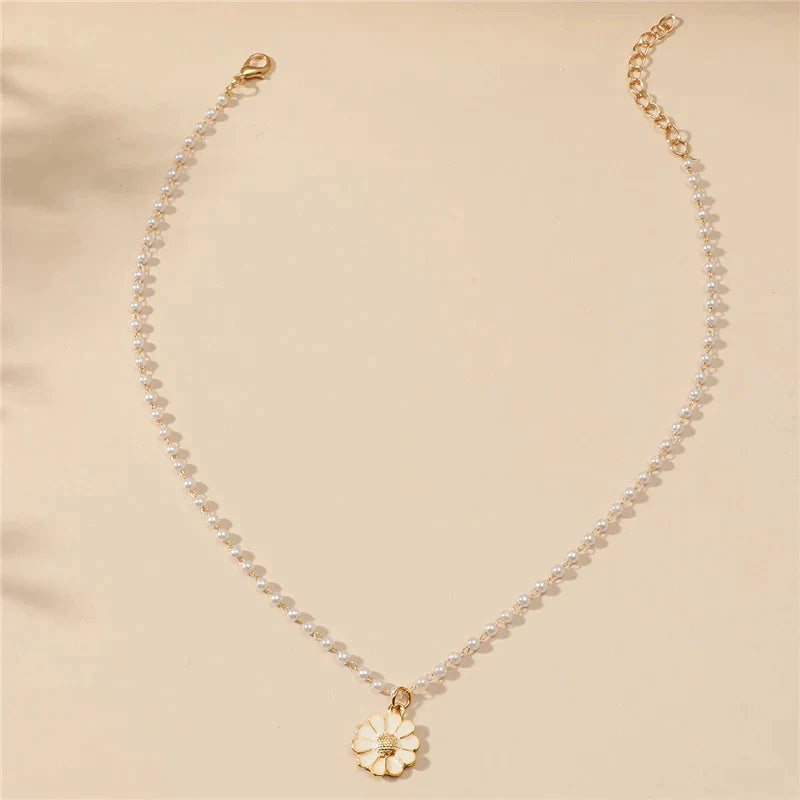 Pendentif marguerite avec perle