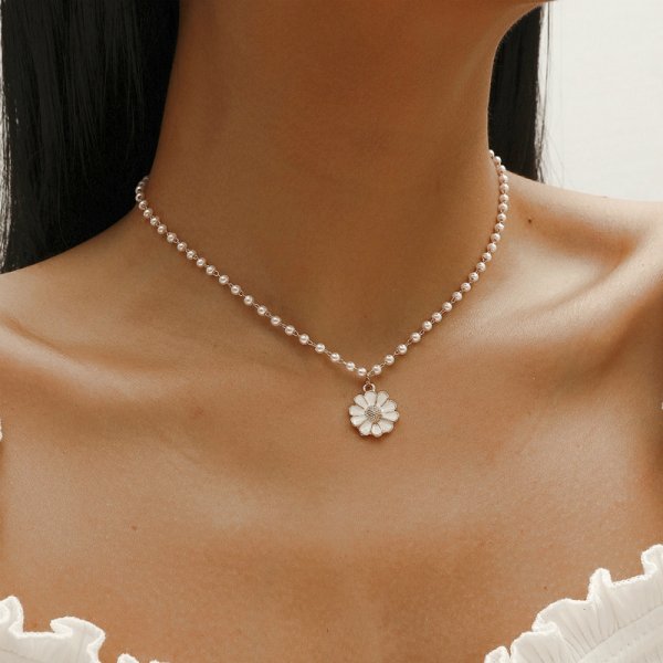 Pendentif marguerite avec perle