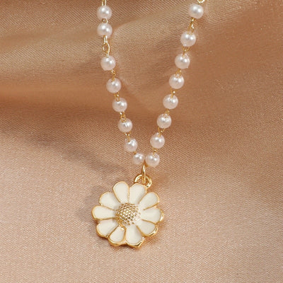 Pendentif marguerite avec perle