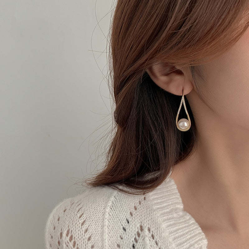 Boucles d'oreilles en perles d'or rose