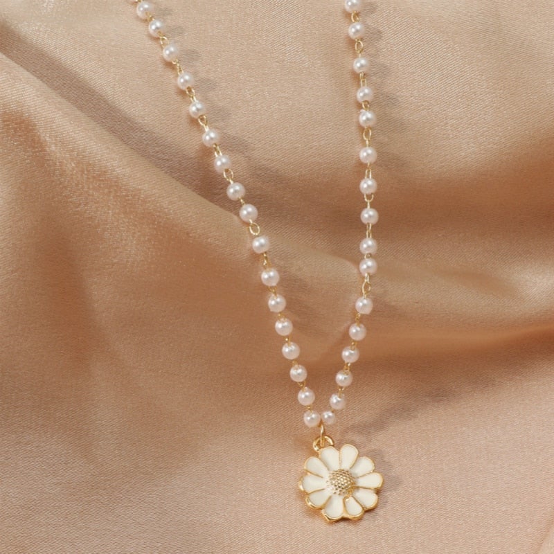 Pendentif marguerite avec perle